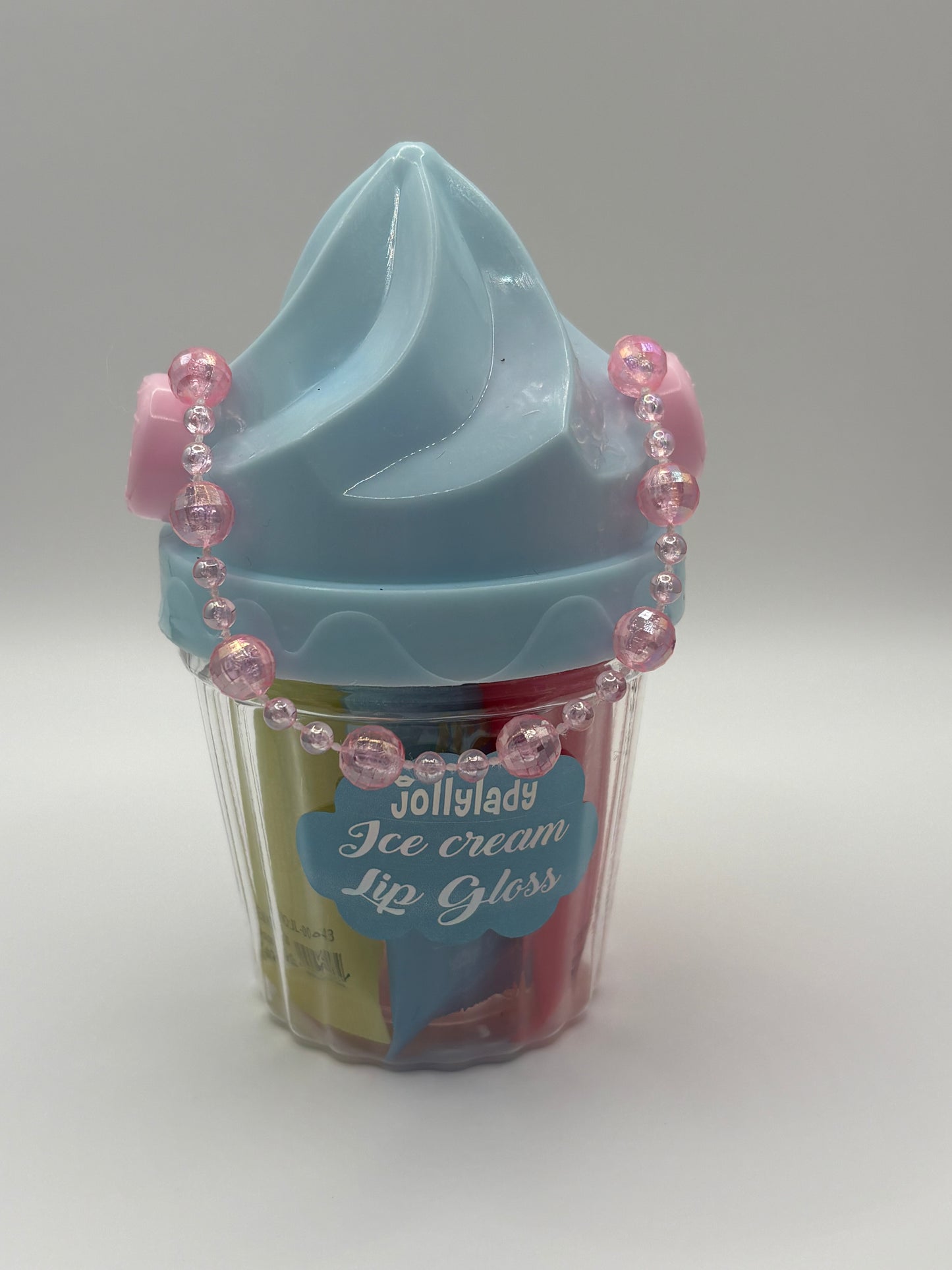 5 flavor lip glosses in icecream container