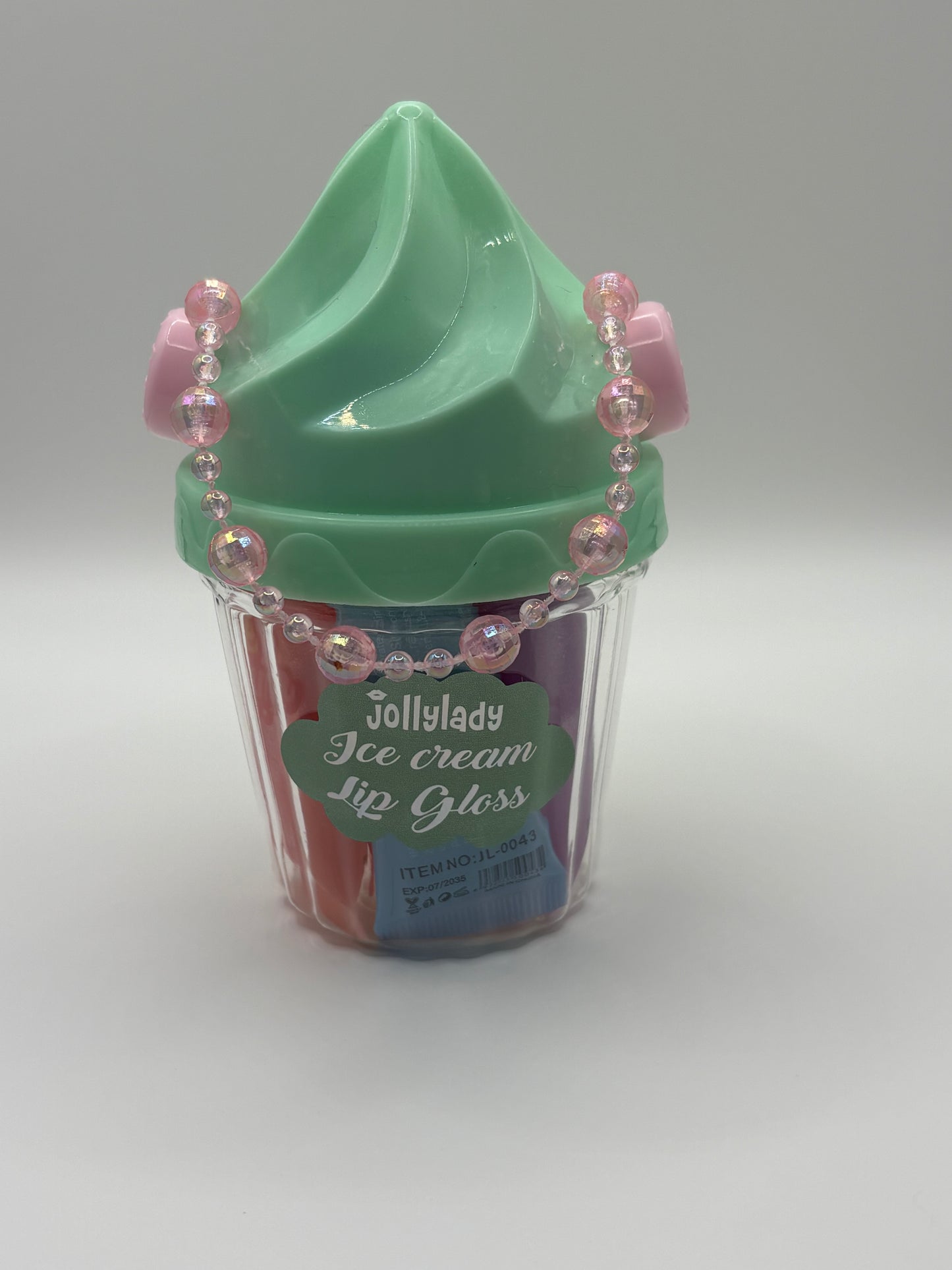 5 flavor lip glosses in icecream container