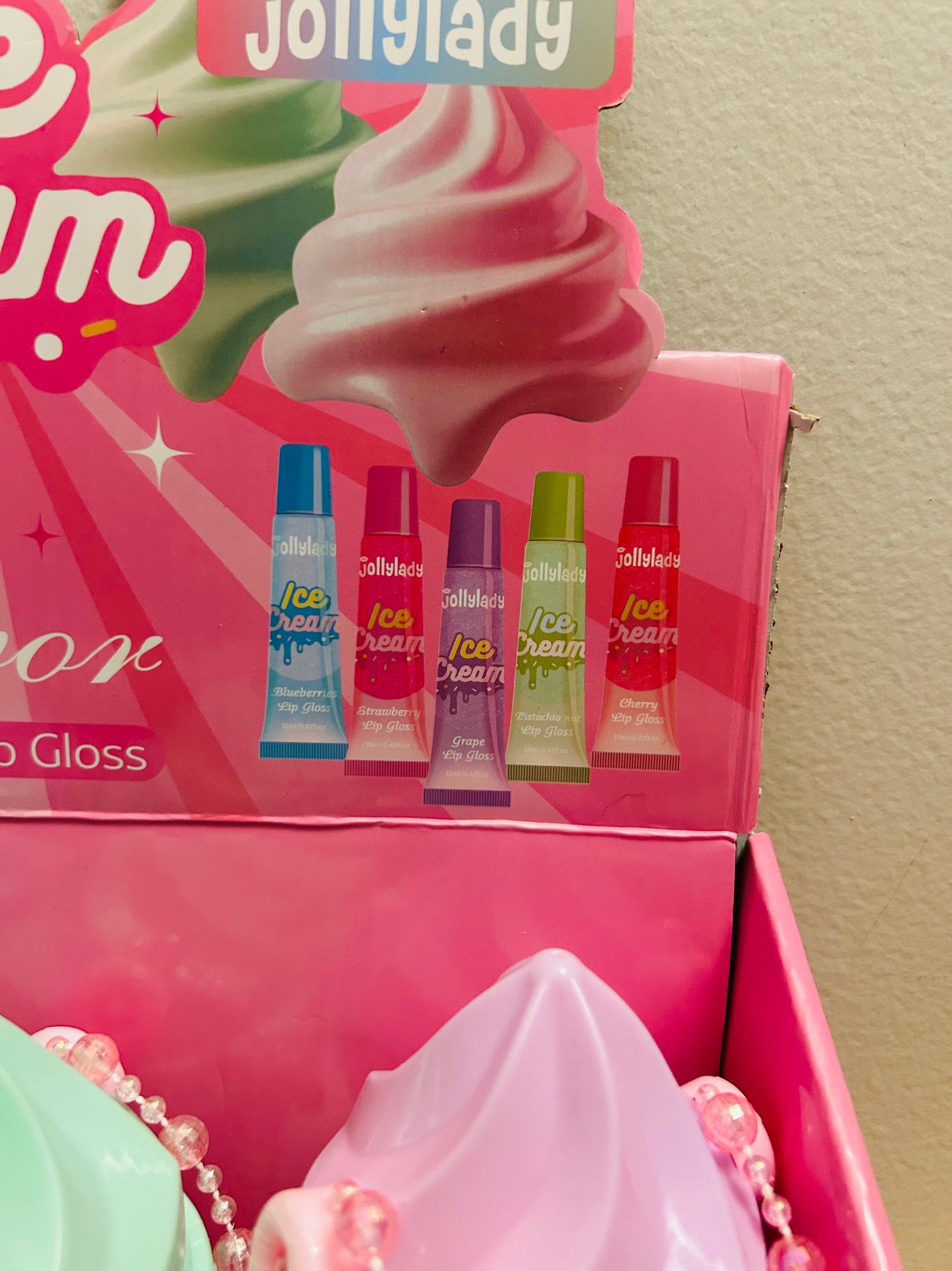 5 flavor lip glosses in icecream container